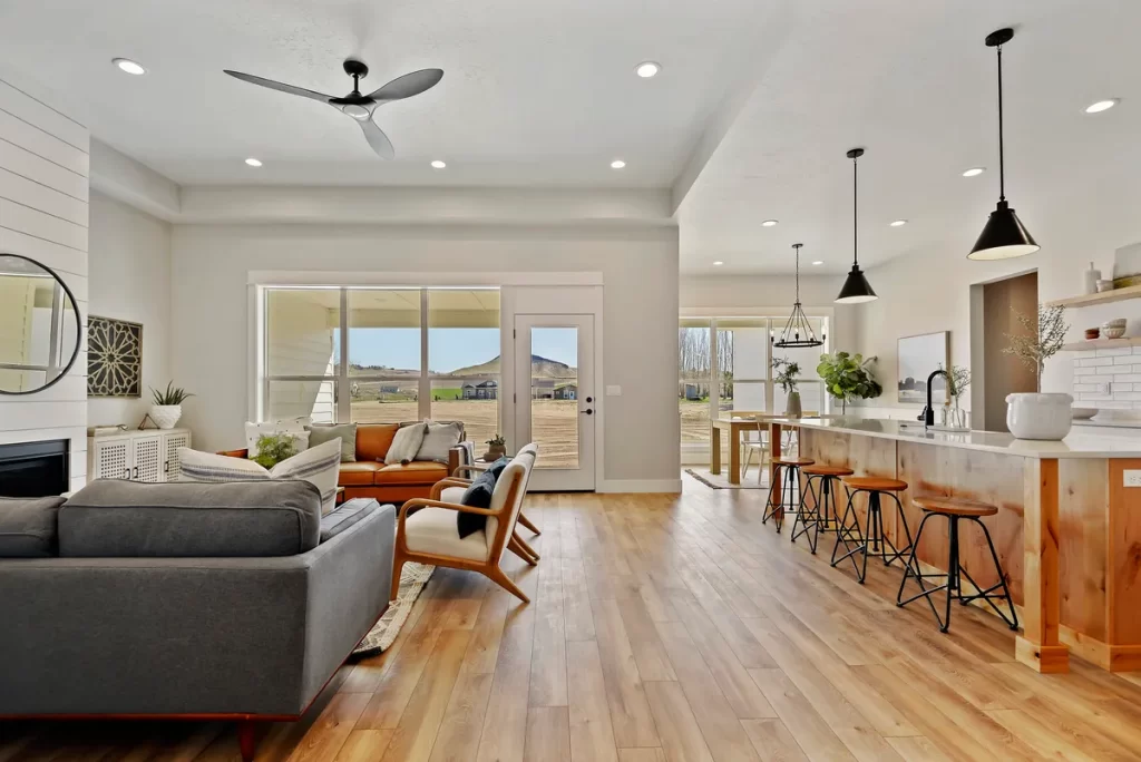 Open-concept custom home interior with kitchen, dining, and living areas