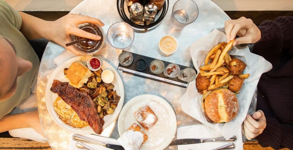 Friends sharing a meal at a Boise restaurant